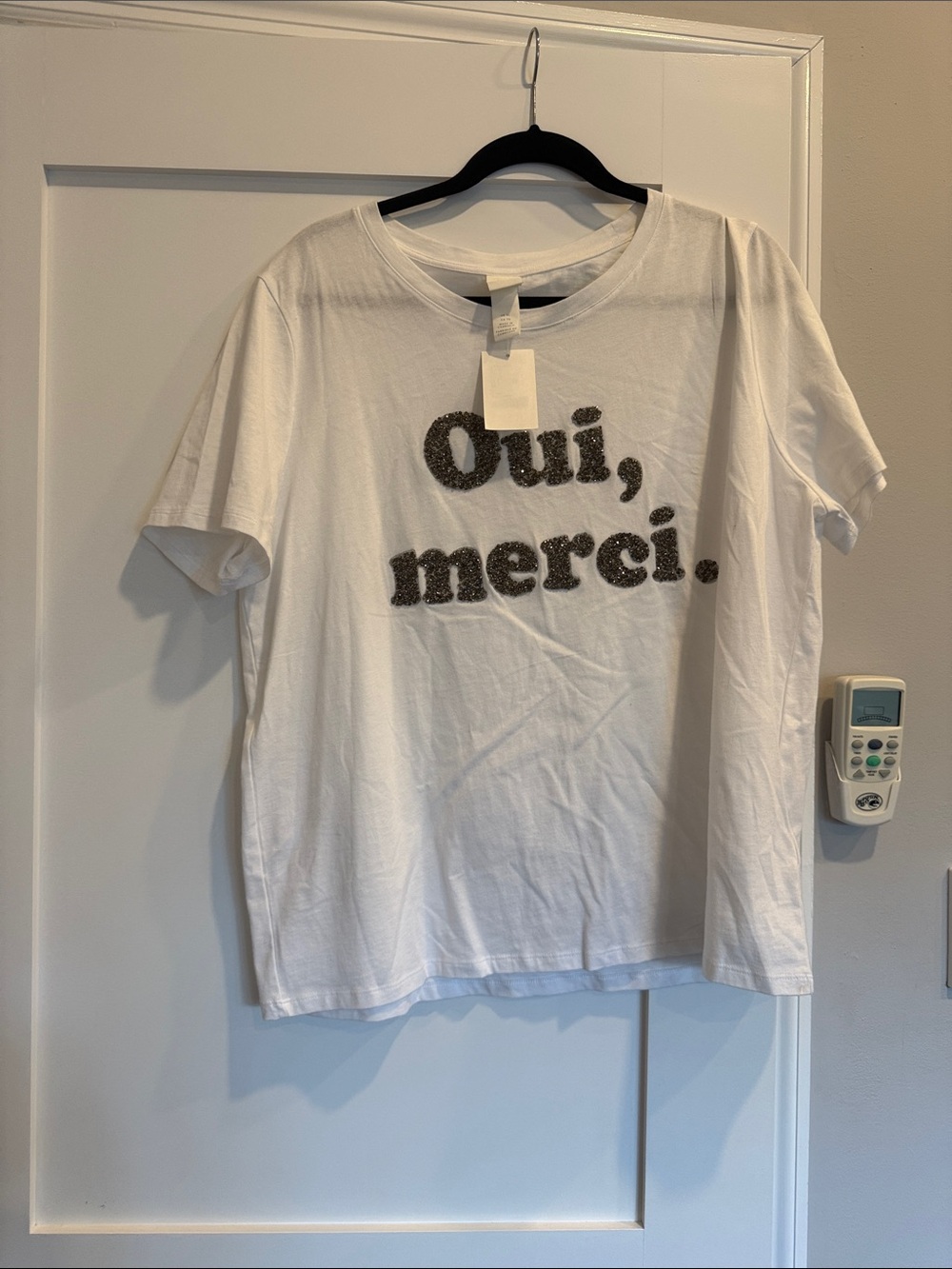 H&M White Short-Sleeve Tee with 'Oui, merci.' Glitter Graphic